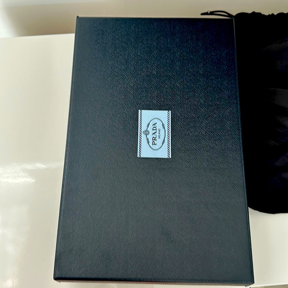 Prada box and dusty bag